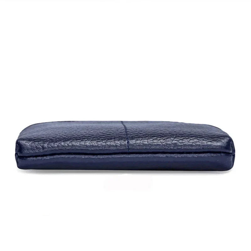 Arely | Kompakt resväska i äkta läder med nyckelhållare 4